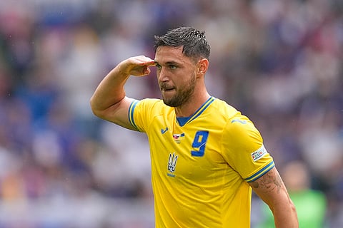 Roman Yaremchuk celebrates after scoring a second goal